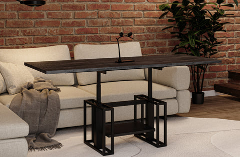 Couchtisch Victoria, ausgezogen und in maximaler Höhe. In der Farbe Beton Dunkel in einem Wohnzimmer.